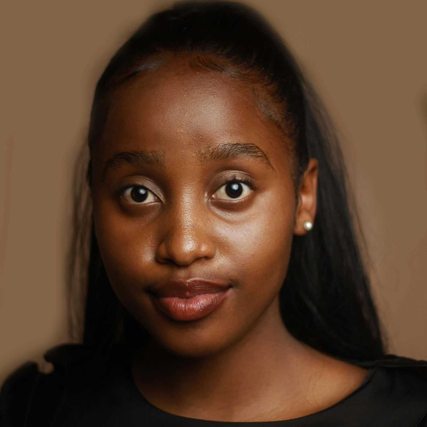 Portrait of Ava Patel, a professional stylist at Wisp Nail Salon & Spa, showcasing their expertise and style.