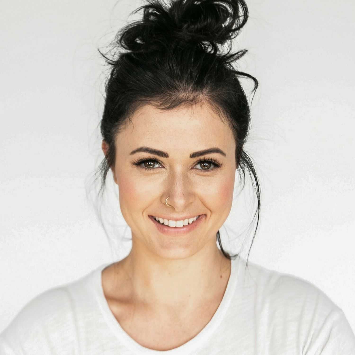 Portrait of Lily Cruz, a professional stylist at Wisp Nail Salon & Spa, showcasing their expertise and style.